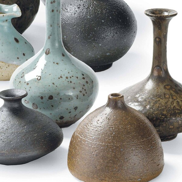 Small porcelain bud vases glazed in blue and brown